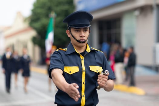 Matamoros, Tamaulipas, Mexico - November 20, 2018: The November 20 Parade, Marching Band with military Style uniform performing at the parade