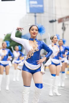 Matamoros, Tamaulipas, Mexico - November 20, 2018: The November 20 Parade, Mexican Cheerleaders dancing during the parade