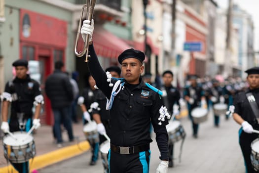 Matamoros, Tamaulipas, Mexico - November 20, 2018: The November 20 Parade, Marching Band with military Style uniform performing at the parade