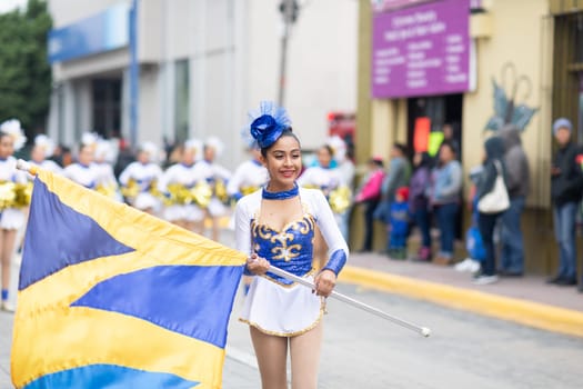 Matamoros, Tamaulipas, Mexico - November 20, 2018: The November 20 Parade, Mexican Cheerleaders dancing during the parade