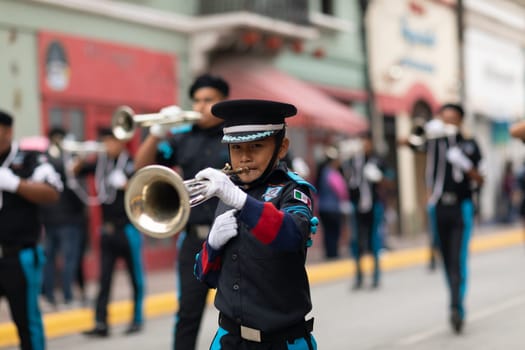 Matamoros, Tamaulipas, Mexico - November 20, 2018: The November 20 Parade, Marching Band with military Style uniform performing at the parade