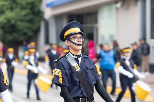 Matamoros, Tamaulipas, Mexico - November 20, 2018: The November 20 Parade, Marching Band with military Style uniform performing at the parade