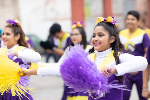 Matamoros, Tamaulipas, Mexico - November 20, 2018: The November 20 Parade, Mexican Cheerleaders dancing during the parade