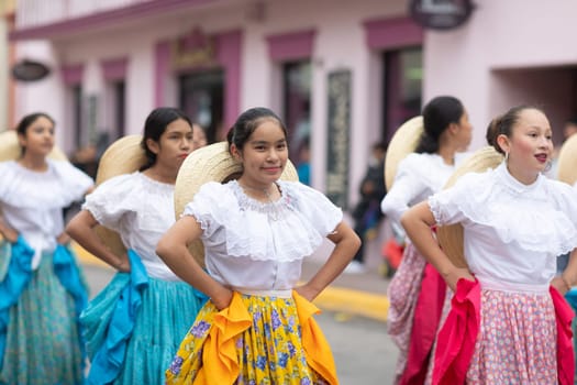 Matamoros, Tamaulipas, Mexico - November 20, 2018: The November 20 Parade, Young women wearing traditional Mexican clothing dancing
