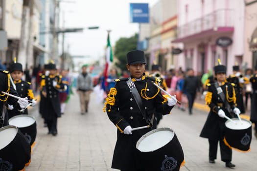 Matamoros, Tamaulipas, Mexico - November 20, 2018: The November 20 Parade, Marching Band with military Style uniform performing at the parade