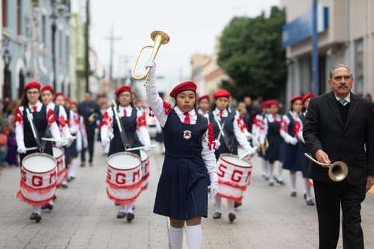Matamoros, Tamaulipas, Mexico - November 20, 2018: The November 20 Parade, Marching Band with military Style uniform performing at the parade