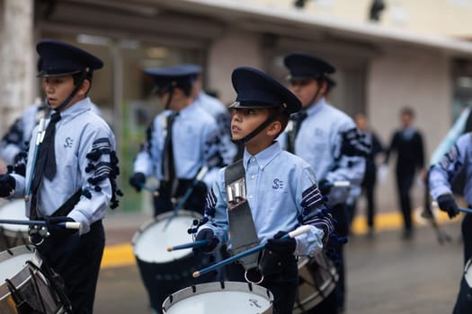 Matamoros, Tamaulipas, Mexico - November 20, 2018: The November 20 Parade, Marching Band with military Style uniform performing at the parade