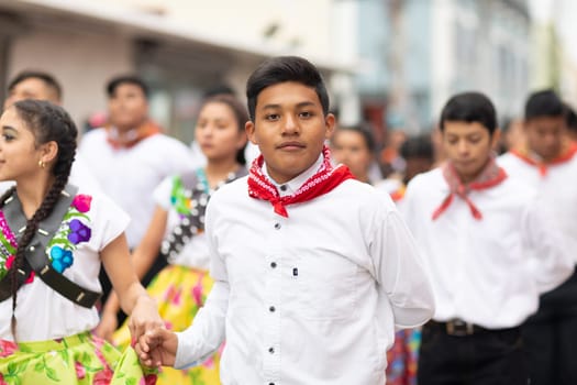 Matamoros, Tamaulipas, Mexico - November 20, 2018: The November 20 Parade, Young women and men dancing wearing traditional mexican clothing during the parade