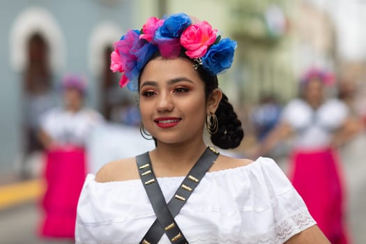 Matamoros, Tamaulipas, Mexico - November 20, 2018: The November 20 Parade, Young Woman wearing traditional Mexican clothing walking down the road
