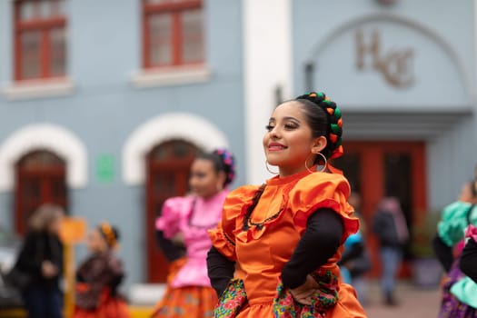 Matamoros, Tamaulipas, Mexico - November 20, 2018: The November 20 Parade, Young women wearing traditional Mexican clothing dancing