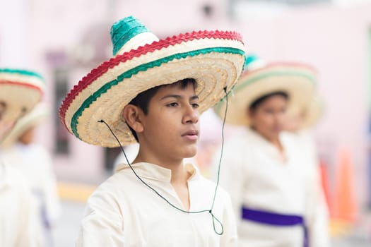 Matamoros, Tamaulipas, Mexico - November 20, 2018: The November 20 Parade, Young men wearing traditional mexican clothing with sombreros at the parade