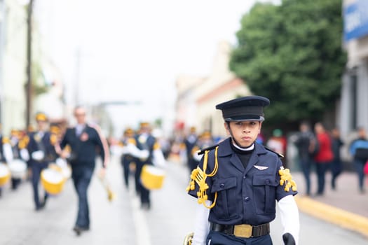Matamoros, Tamaulipas, Mexico - November 20, 2018: The November 20 Parade, Marching Band with military Style uniform performing at the parade