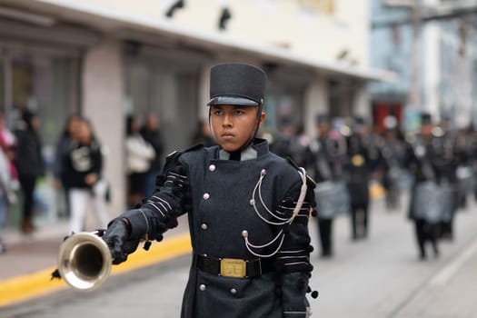 Matamoros, Tamaulipas, Mexico - November 20, 2018: The November 20 Parade, Marching Band with military Style uniform performing at the parade