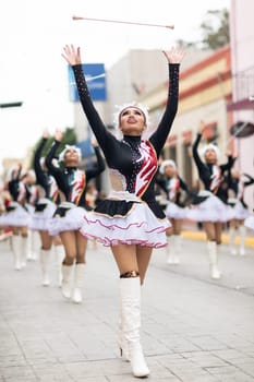 Matamoros, Tamaulipas, Mexico - November 20, 2018: The November 20 Parade, Mexican Cheerleaders dancing during the parade
