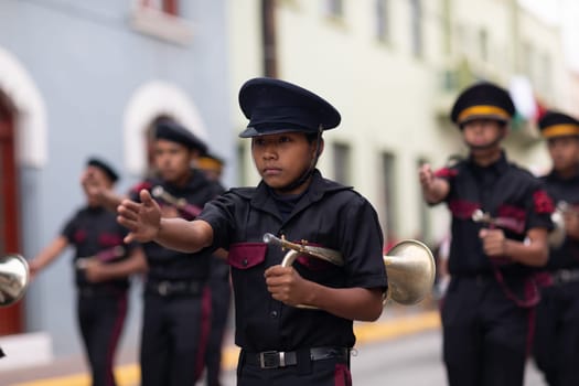 Matamoros, Tamaulipas, Mexico - November 20, 2018: The November 20 Parade, Marching Band with military Style uniform performing at the parade