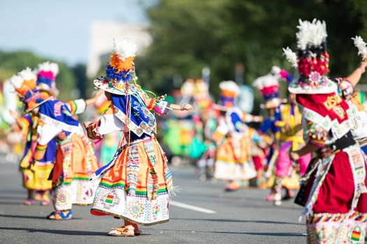 Washington, D.C., USA - September 29, 2018: The Fiesta DC Parade, Bolivian women wearing traditional clothing performing a traditional dance from bolivia