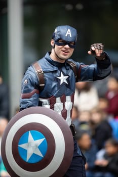 Houston, Texas, USA - November 22, 2018 The H-E-B Thanksgiving Day Parade, Man dress up as Captain America, Marvel character, during the parade
