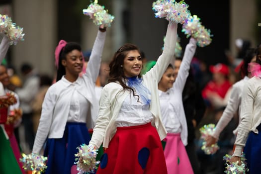 Houston, Texas, USA - November 22, 2018 The H-E-B Thanksgiving Day Parade, Members of the Spring High School Starlettes dance group performing at the parade