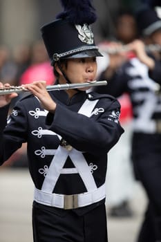 Houston, Texas, USA - November 22, 2018 The H-E-B Thanksgiving Day Parade, The Kingwood Mighty Mustang Marching Band performing at the parade