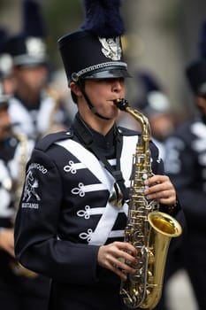 Houston, Texas, USA - November 22, 2018 The H-E-B Thanksgiving Day Parade, The Kingwood Mighty Mustang Marching Band performing at the parade