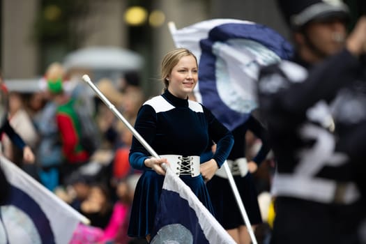 Houston, Texas, USA - November 22, 2018 The H-E-B Thanksgiving Day Parade, The Kingwood Mighty Mustang Marching Band performing at the parade