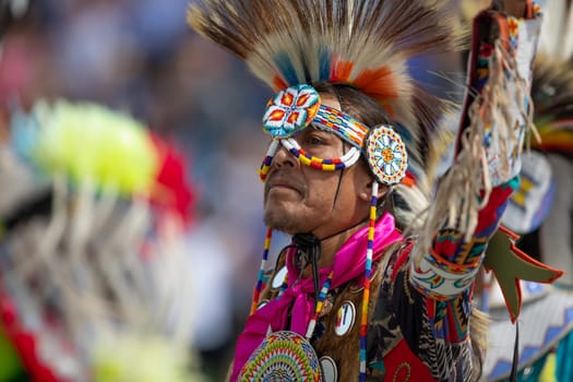 Milwaukee, Wisconsin, USA - September 8, 2018 The Indian Summer Festival Man wearing traditional native american clothing at the pow wow competition.