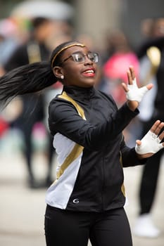Houston, Texas, USA - November 22, 2018 The H-E-B Thanksgiving Day Parade, Texas Youth Academy Original Thunder Cheerleaders dancing at the parade