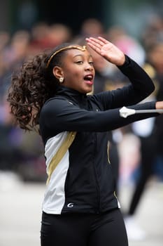 Houston, Texas, USA - November 22, 2018 The H-E-B Thanksgiving Day Parade, Texas Youth Academy Original Thunder Cheerleaders dancing at the parade