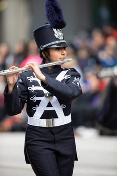 Houston, Texas, USA - November 22, 2018 The H-E-B Thanksgiving Day Parade, The Kingwood Mighty Mustang Marching Band performing at the parade