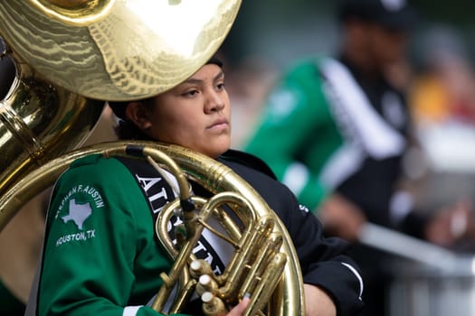 Houston, Texas, USA - November 22, 2018 The H-E-B Thanksgiving Day Parade, Members of the Stephen F. Austin High School marching band performing at the parade