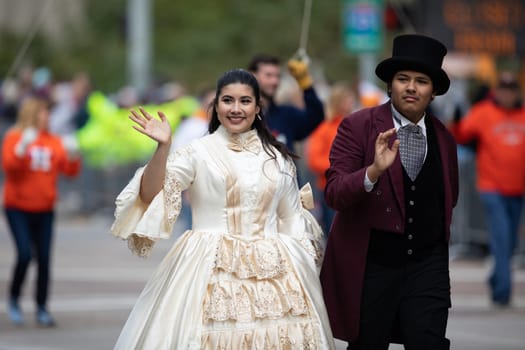 Houston, Texas, USA - November 22, 2018 The H-E-B Thanksgiving Day Parade, Man and woman wearing traditional American clothing