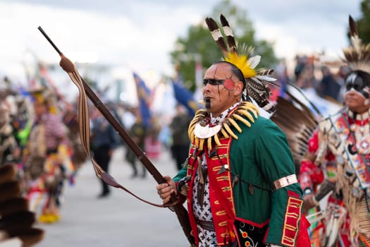 Milwaukee, Wisconsin, USA - September 8, 2018 The Indian Summer Festival Man wearing traditional native american clothing at the pow wow competition.