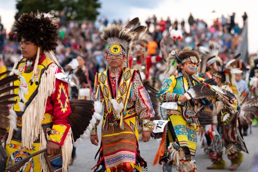 Milwaukee, Wisconsin, USA - September 8, 2018 The Indian Summer Festival, Boy wearing traditional native american clothing at the pow wow competition.