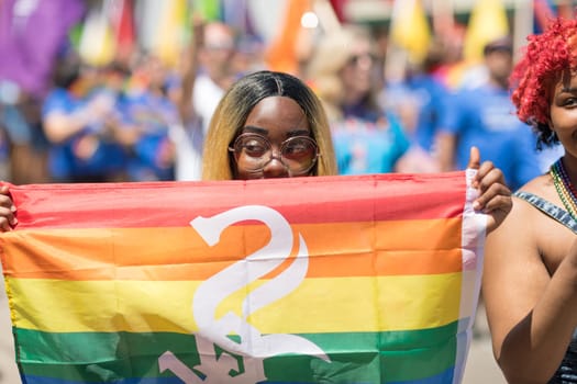 Chicago, Illinois, USA - June 24, 2018: the LGBTQ Pride Parade, People wearing colorfull outfits, celebrating on the streets of Chicago