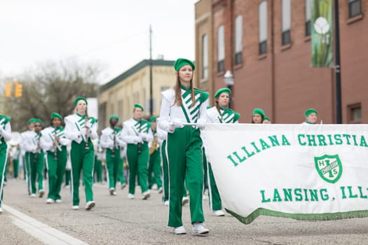 Holland, Michigan, USA - May 12, 2018 Members of the Illiana Christian H.S. from Lansing, Illinois perform at the Muziek Parade, during the Tulip Time Festival