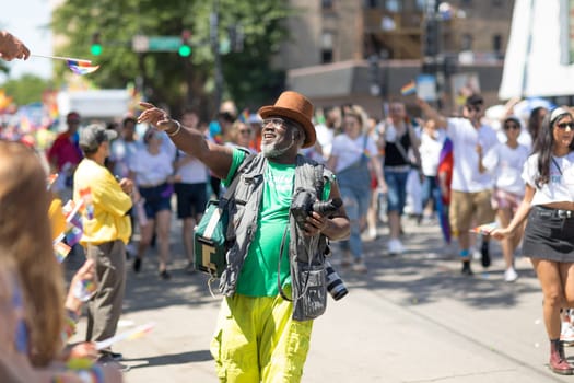 Chicago, Illinois, USA - June 24, 2018: the LGBTQ Pride Parade, People wearing colorfull outfits, celebrating on the streets of Chicago
