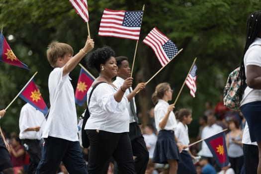 Washington, D.C., USA - July 4, 2018, The National Independence Day Parade, Members of the salvation army going down constitution avenue during the parade
