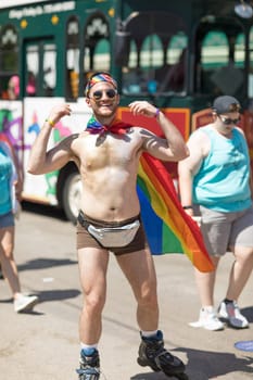 Chicago, Illinois, USA - June 24, 2018: the LGBTQ Pride Parade, People wearing colorfull outfits, celebrating on the streets of Chicago