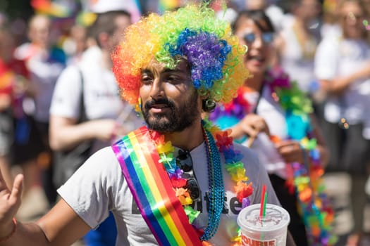 Chicago, Illinois, USA - June 24, 2018: the LGBTQ Pride Parade, People wearing colorfull outfits, celebrating on the streets of Chicago