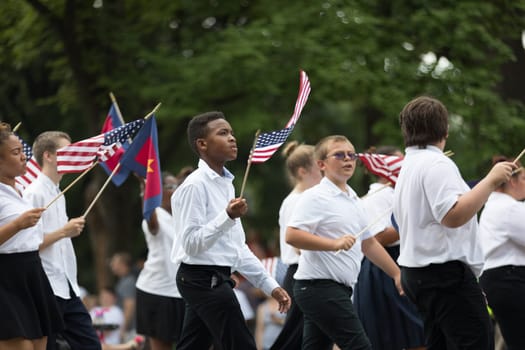 Washington, D.C., USA - July 4, 2018, The National Independence Day Parade, Members of the salvation army going down constitution avenue during the parade