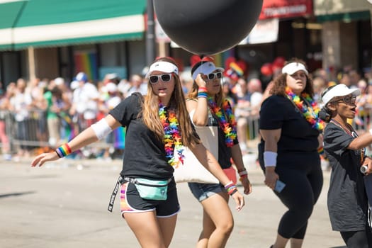 Chicago, Illinois, USA - June 24, 2018: the LGBTQ Pride Parade, People wearing colorfull outfits, celebrating on the streets of Chicago