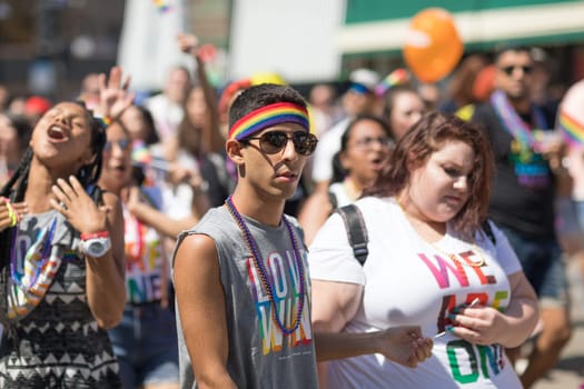 Chicago, Illinois, USA - June 24, 2018: the LGBTQ Pride Parade, People wearing colorfull outfits, celebrating on the streets of Chicago