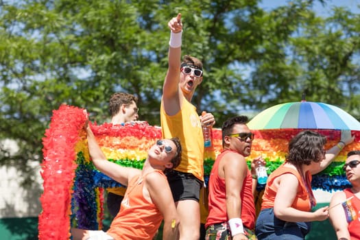 Chicago, Illinois, USA - June 24, 2018: the LGBTQ Pride Parade, People wearing colorfull outfits, celebrating on the streets of Chicago