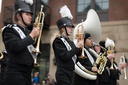 Holland, Michigan, USA - May 12, 2018 Members of the West Ottawa High School Marching Band, Holland MI, perform at the Muziek Parade, during the Tulip Time Festival
