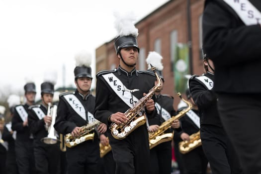 Holland, Michigan, USA - May 12, 2018 Members of the West Ottawa High School Marching Band, Holland MI, perform at the Muziek Parade, during the Tulip Time Festival
