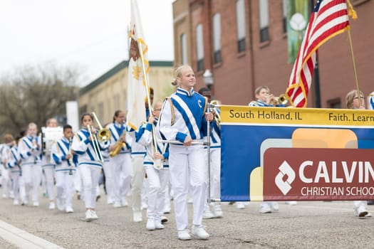 Holland, Michigan, USA - May 12, 2018 Members of the Calvin Christian School Marching Band at the Muziek Parade, during the Tulip Time Festival