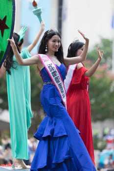 Washington, D.C., USA - July 4, 2018, The National Independence Day Parade, Taiwanese beauty queens on a float, going down constitution avenue during the parade
