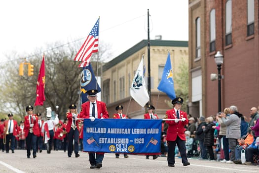 Holland, Michigan, USA - May 12, 2018 Members of the Holland American Legion Band, Established - 1920 perform at the Muziek Parade, during the Tulip Time Festival