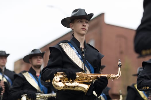 Holland, Michigan, USA - May 12, 2018 The Wildcats Mattawan Marching band at the Muziek Parade, during the Tulip Time Festival