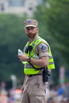 Washington, D.C., USA - July 4, 2018, Police officer stands guard at the National Independence Day Parade